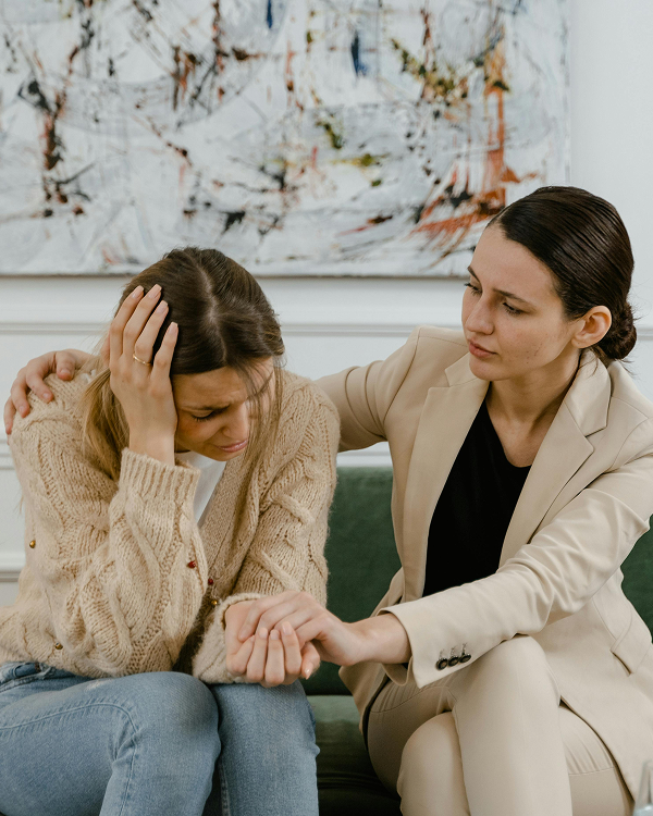 Client and therapist on couch