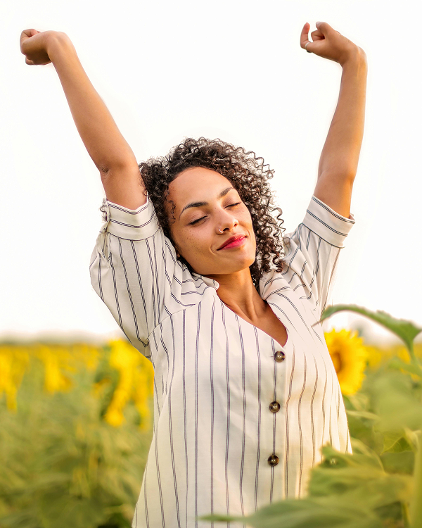 Women in sunflower field